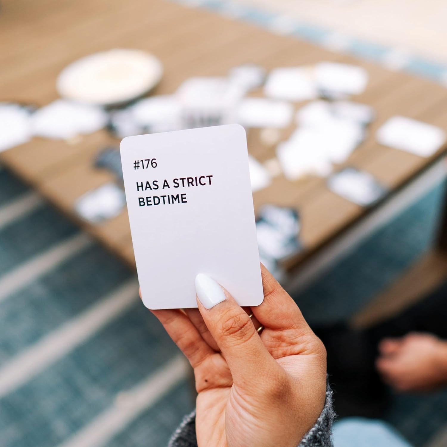 DSS Games Who's Most Likely to...Kinda Clean Family Edition [A Party Game | Great for Adults & Teens | White Elephant Gift, Stocking Stuffer | Game Nights & Big Groups]