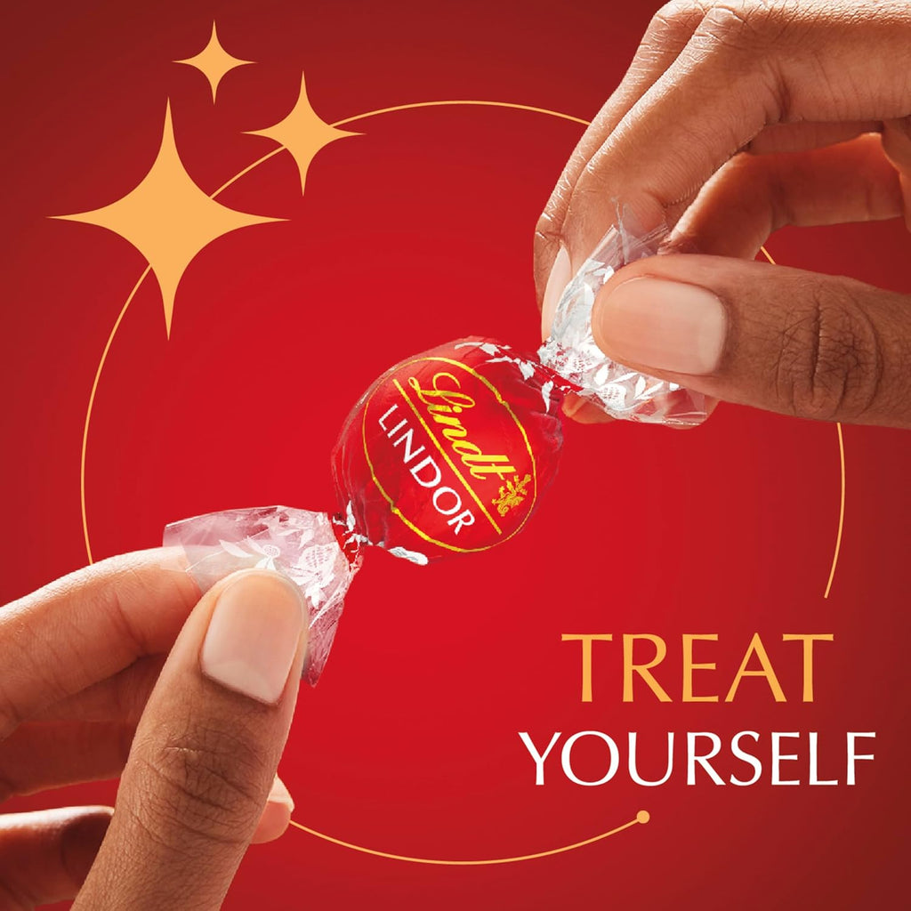 Lindt LINDOR Milk Chocolate Candy Truffles, Milk Chocolate with Melting Truffle Center, 15.2 oz. Bag