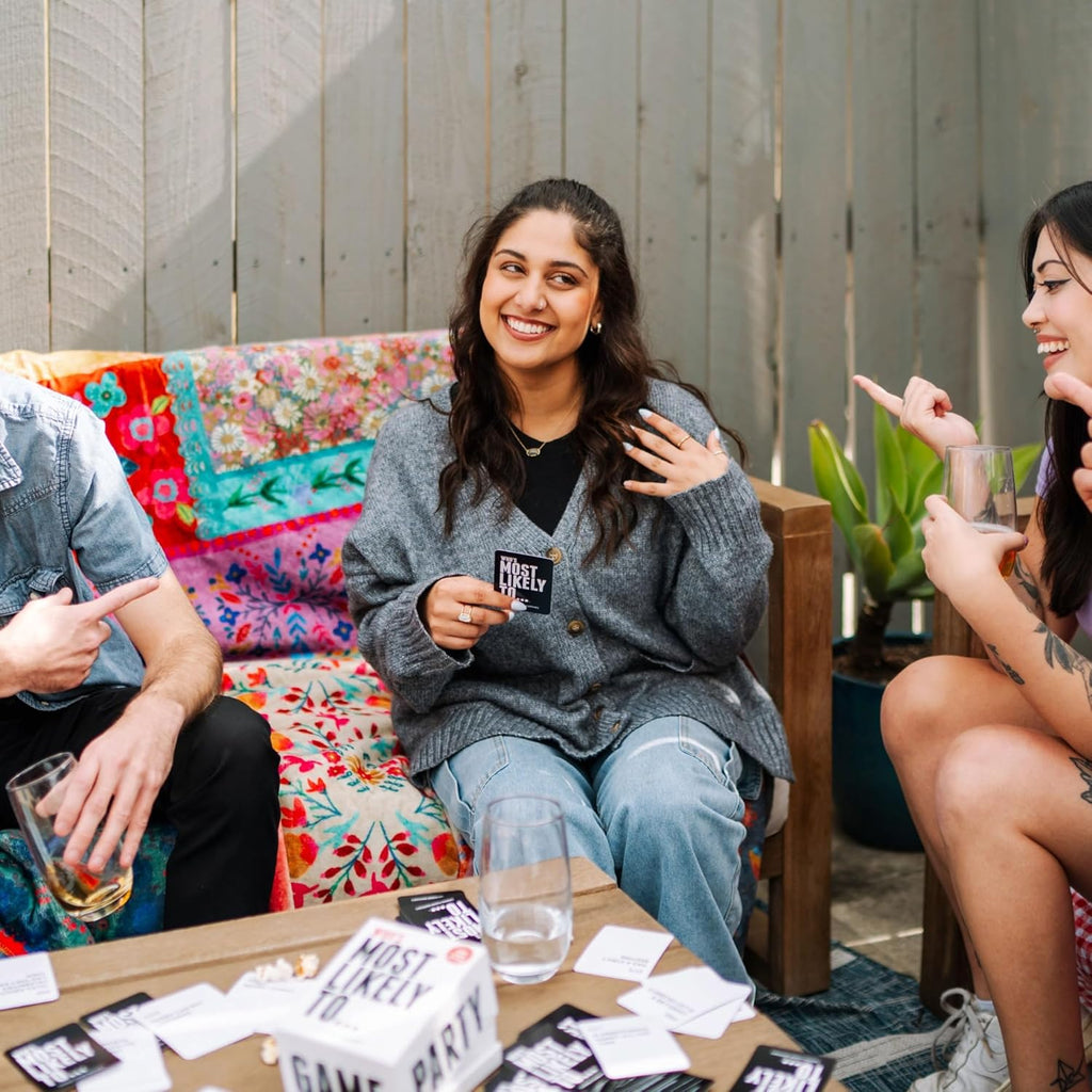 DSS Games Who's Most Likely to...Kinda Clean Family Edition [A Party Game | Great for Adults & Teens | White Elephant Gift, Stocking Stuffer | Game Nights & Big Groups]